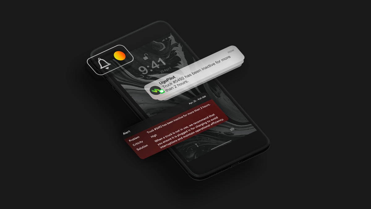 Cell_phone_displaying_UgoPilot_fleet_management_software_inactivity_notification_on_black_canva
