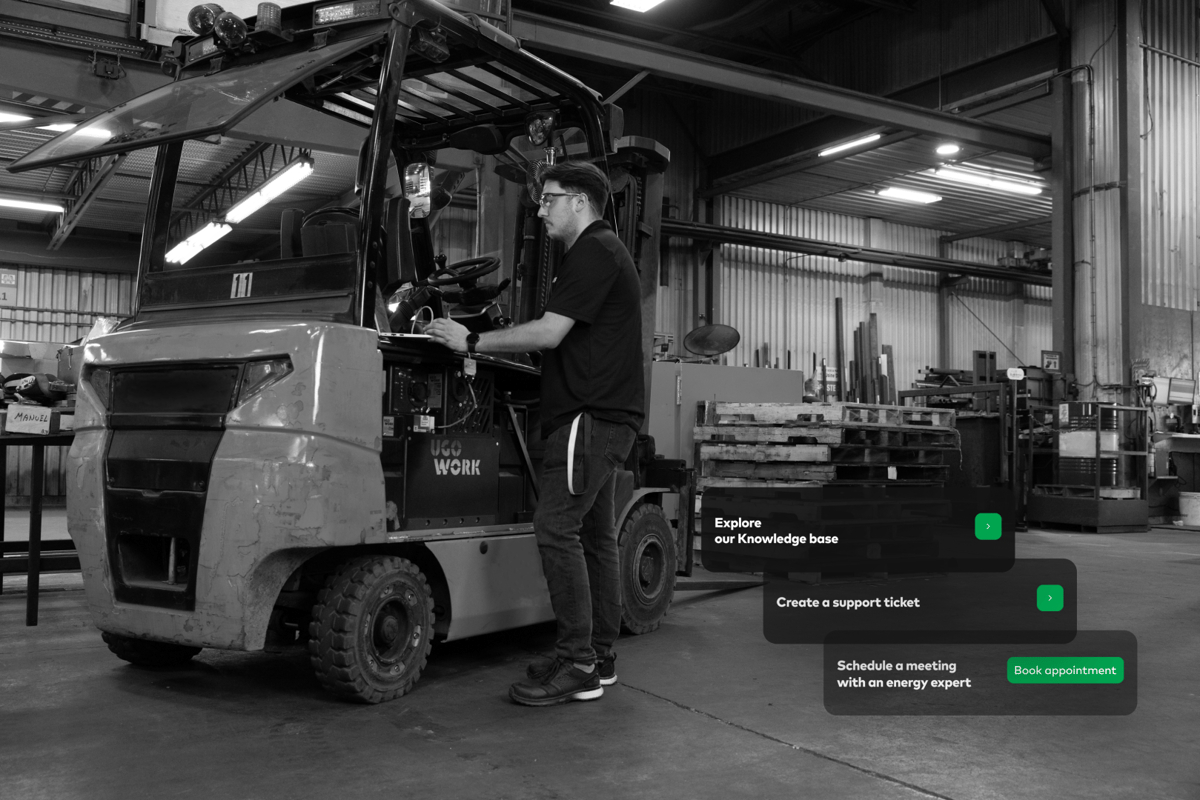 Technician_doing_maintenance_on_UgoWork_lithium_ion_forklift_battery_on_shop_floor